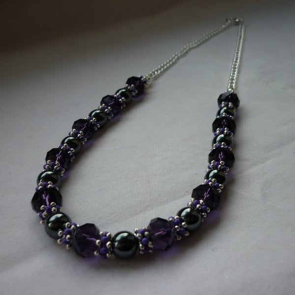 PURPLE, HEMATITE AND SILVER NECKLACE.  997