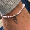 Pink Swarovski Pearl stretch bracelet with silver heart charm