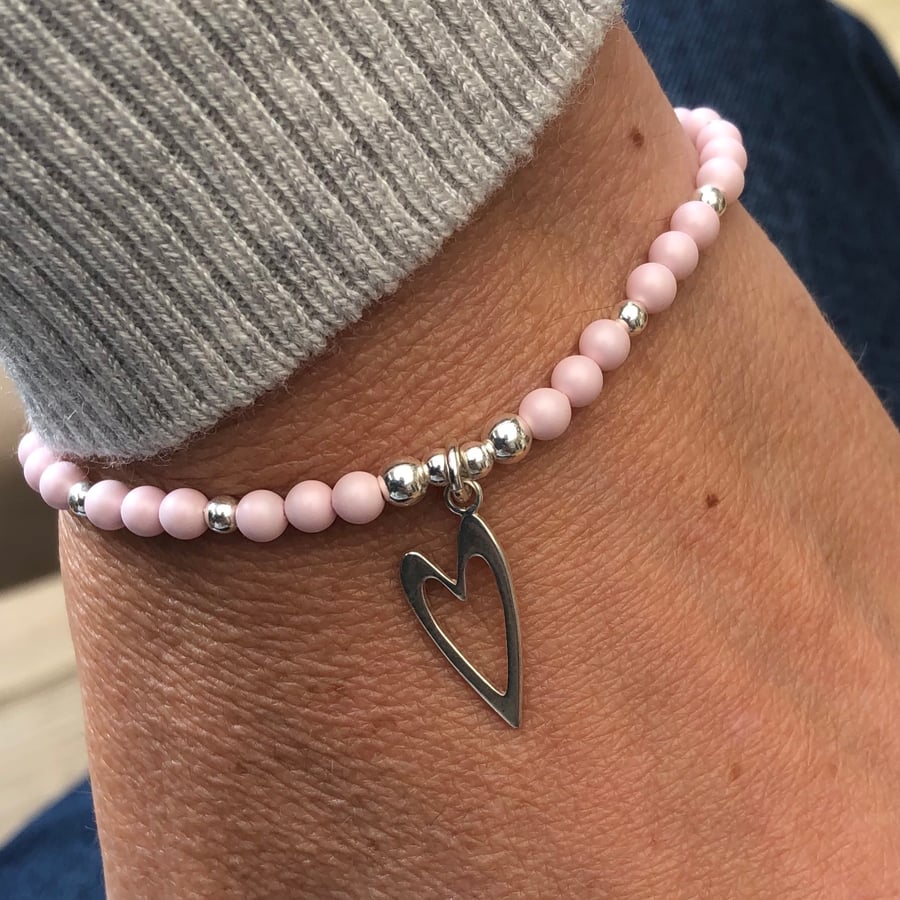 Pink Swarovski Pearl stretch bracelet with silver heart charm