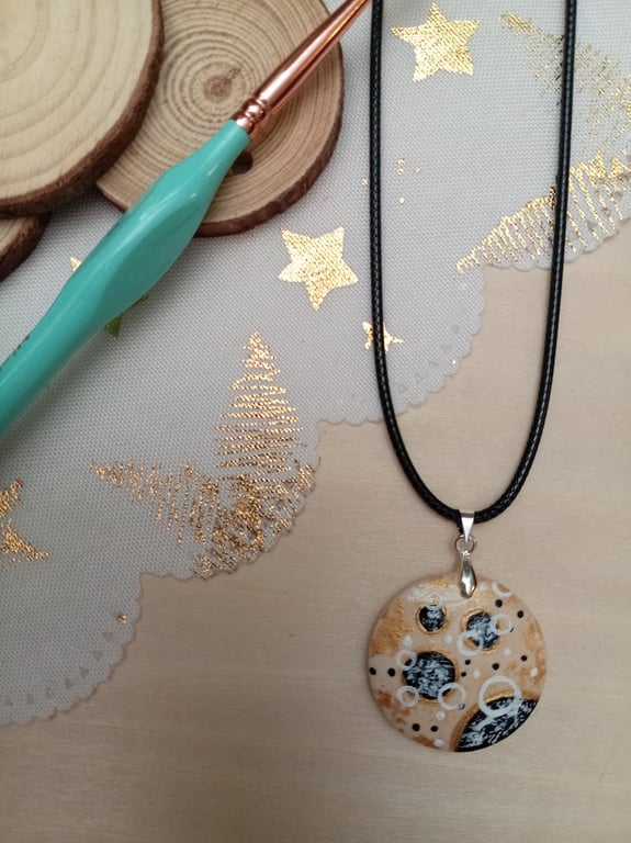 Circular patterned hand painted wooden necklace 