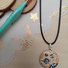 Circular patterned hand painted wooden necklace 