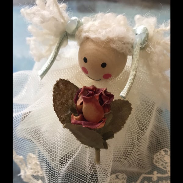Set of three lavender dolls