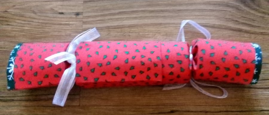 Christmas crackers. Homemade, Christmas trees on red