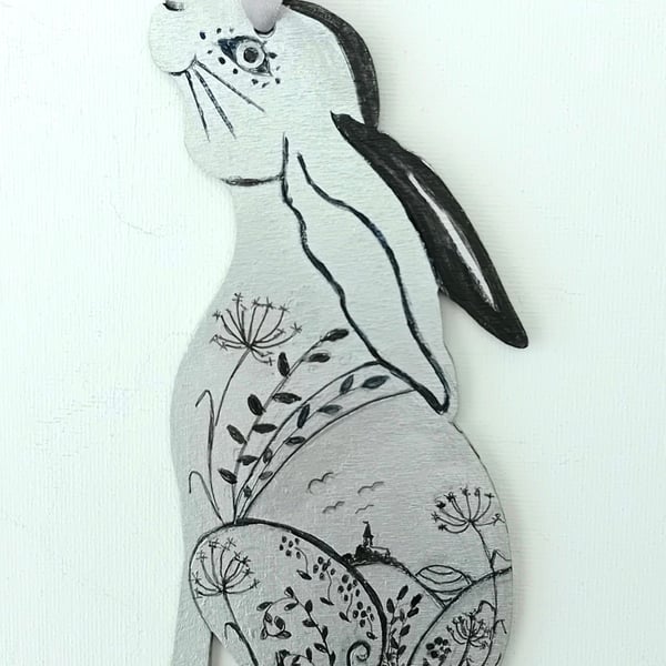 Silvery sitting hare