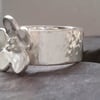 Wide silver hammered band flower ring