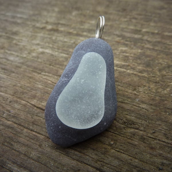 Pendant - frosted white sea glass on dark beach stone