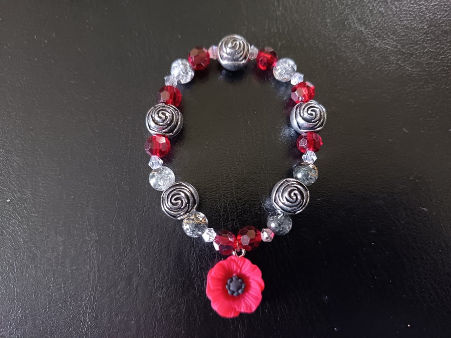 Elasticated red and silver chunky beaded bracelet 