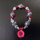 Elasticated red and silver chunky beaded bracelet 