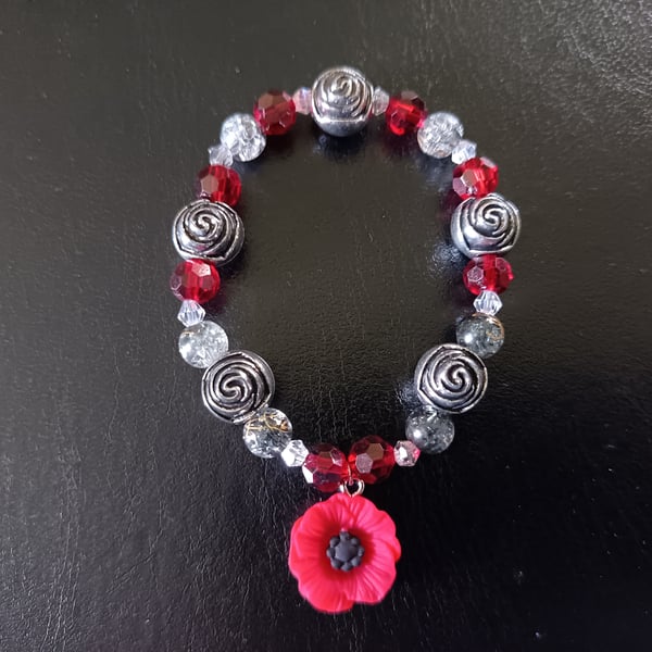 Elasticated red and silver chunky beaded bracelet 
