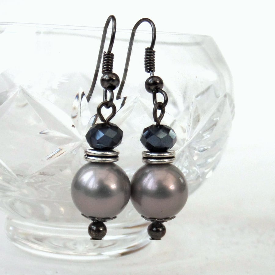 Silver shell pearl and jet crystal earrings on gunmetal wires