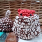Red Squirrel inside an acorn basket