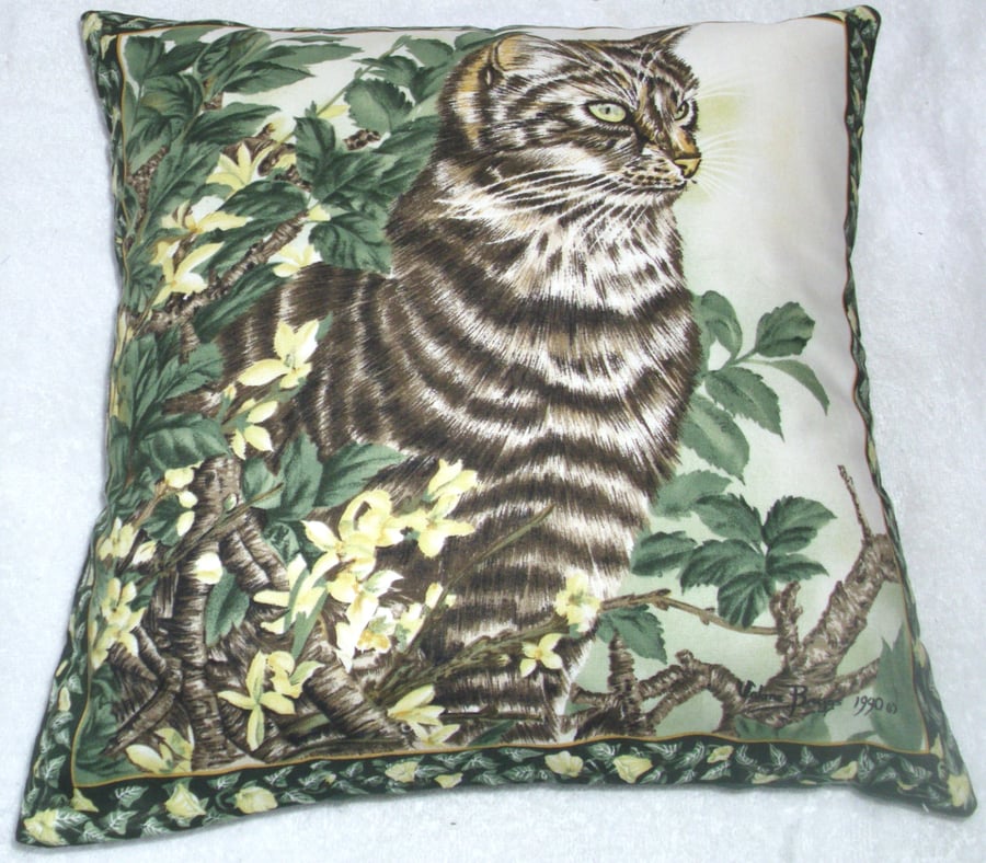 Beautiful young Scottish Wildcat up in a tree cushion