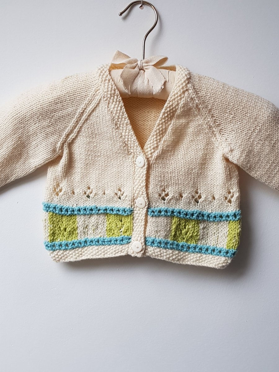 0-6  months cream cardigan with patterned border