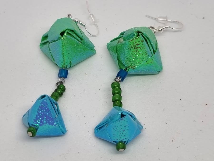 Long origami earrings:  light blue and green iridescent paper and small beads 