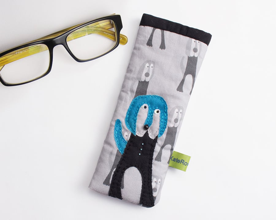 Monochrome dog print glasses case with appliqué dog with turquoise ears and tail
