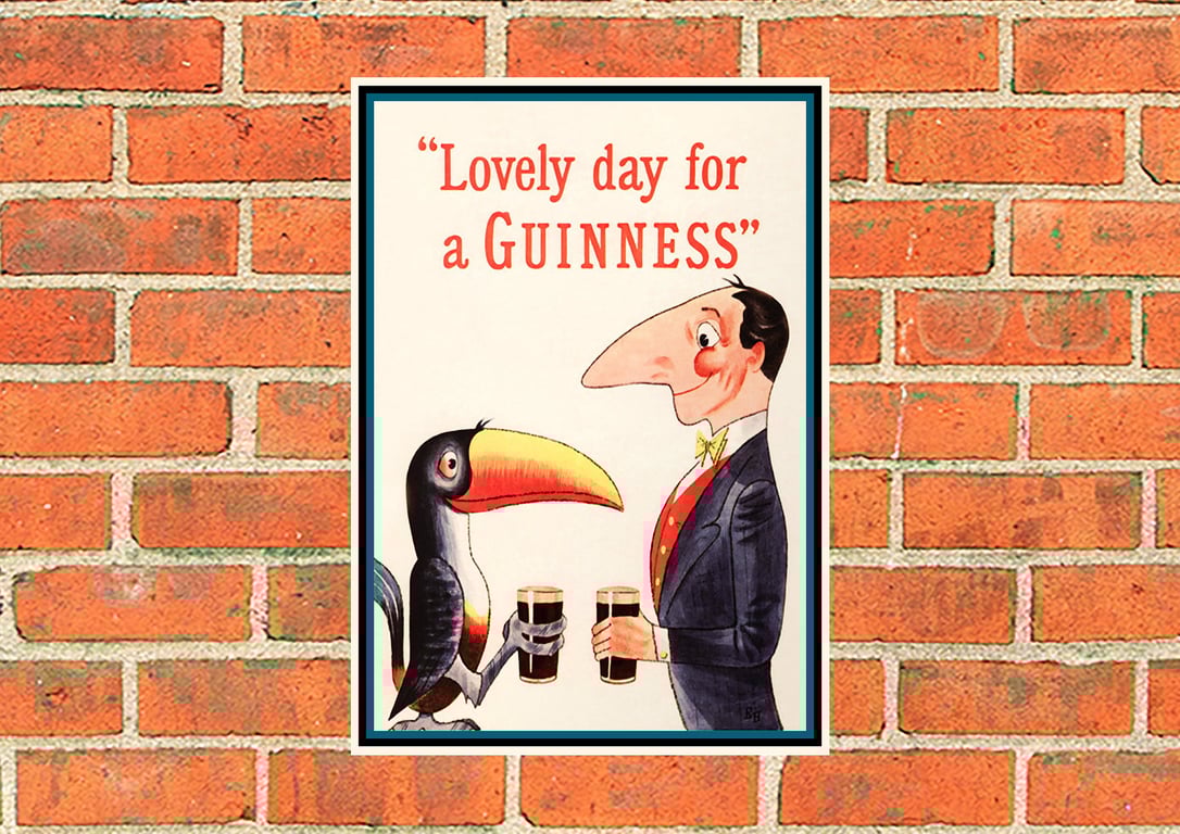 Guinness metal sign. Toucan and man with Guinness. 