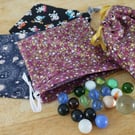 Draw string marble bag and marbles