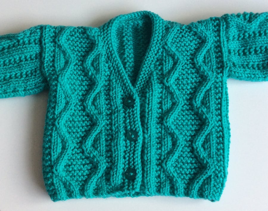 Hand knitted aran baby cardigan 