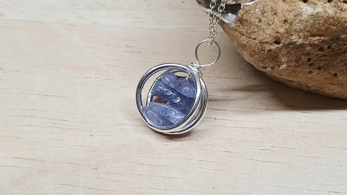Small circle Tanzanite pendant. 925 sterling silver. December Birthstone
