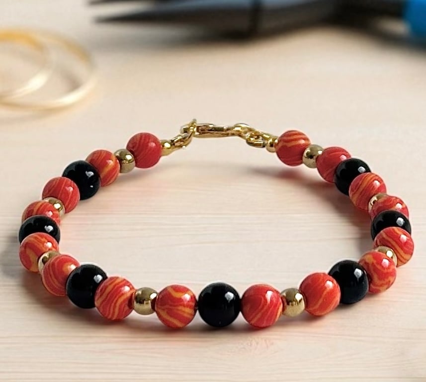 Orange Striped Jasper and Black Onyx Gemstone Bracelet