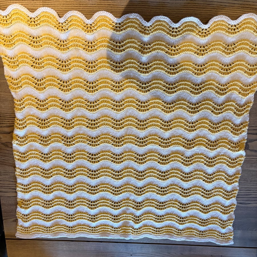 Baby cotton cot blanket in white and lemon