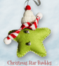 Christmas star hanging decorations baubles in woolly hats, scarves, jingle bells - Image 6