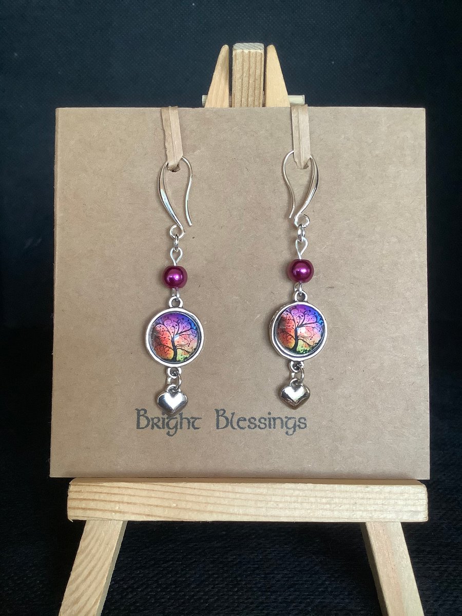 Handmade drop earrings with cabochon, Tibetan silver charm and beads.