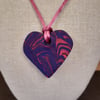 Handmade heart shaped polymer clay pendant