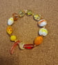 Multicolour lampwork beaded bracelet with novelty beads small size