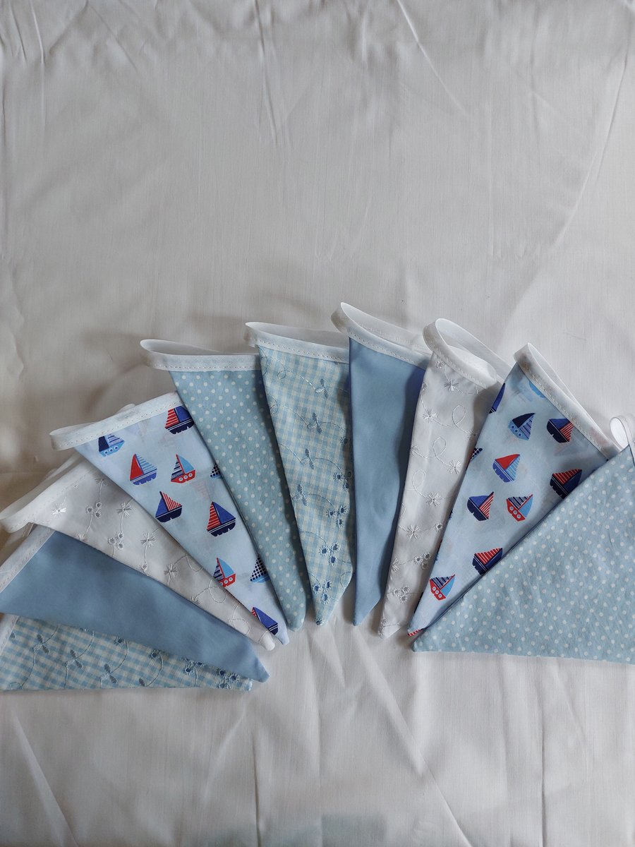 Bunting with sailing boats in baby blue