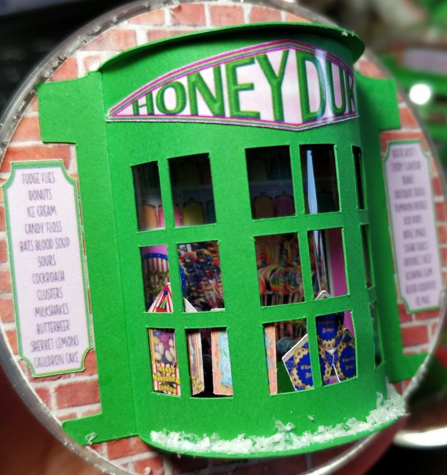 Wizard sweetshop - bauble decoration with handmade intricate 3D papercuts