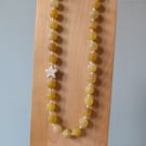 Yellow frosted agate bead and howlite star knotted cord necklace 