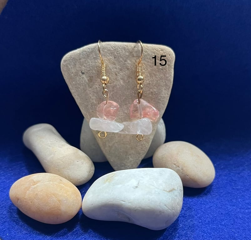 Beautiful dangling earrings with pink and clear stones.