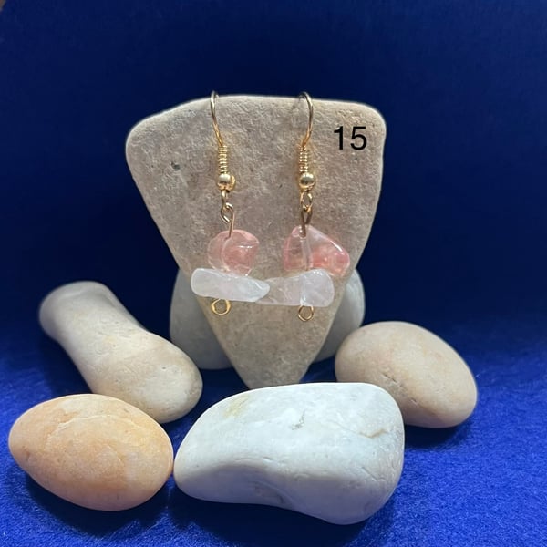 Beautiful dangling earrings with pink and clear stones.