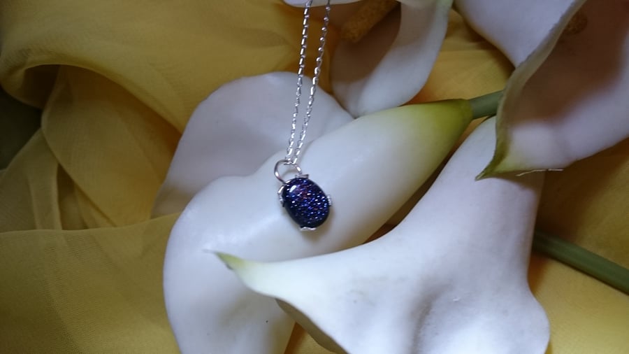 Sterling silver blue goldstone necklace