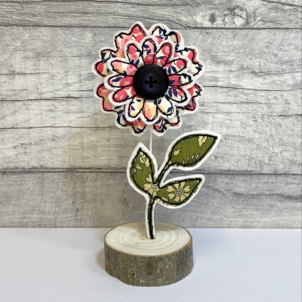 Flower and Leaf on a Wire Stem in a Wooden Stand