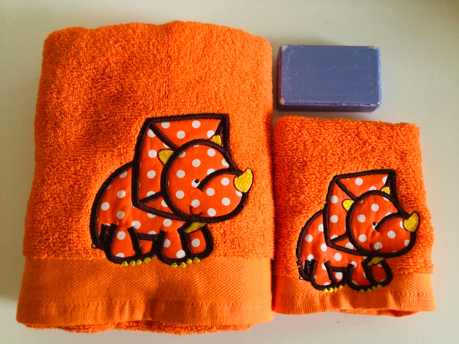 Dinosaur appliquéd Towel and Flannel set. Orange.