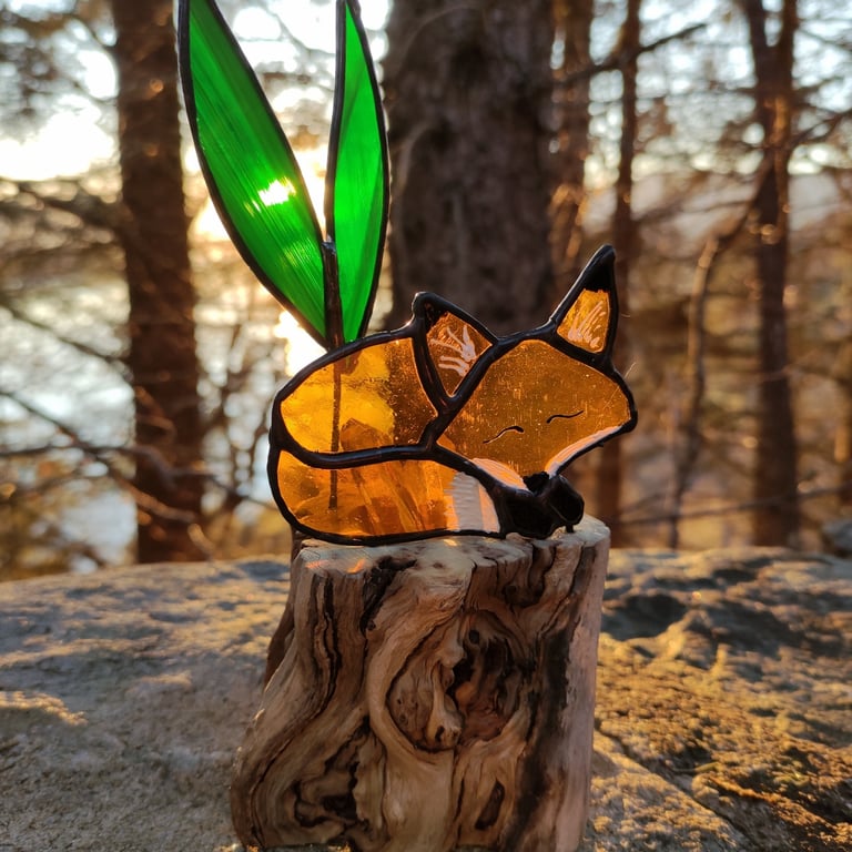 Hand made stained glass fox on a light up tree stump