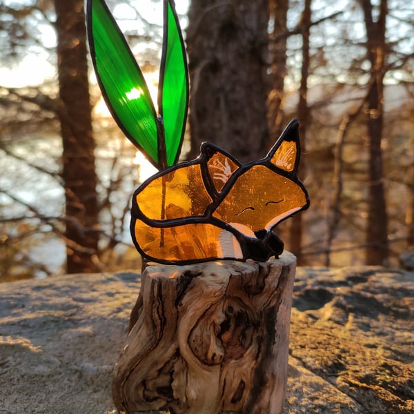 Hand made stained glass fox on a light up tree stump