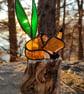 Hand made stained glass fox on a light up tree stump