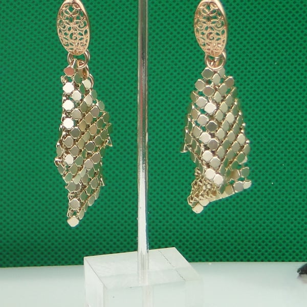 Metallic  rose gold material earrings   