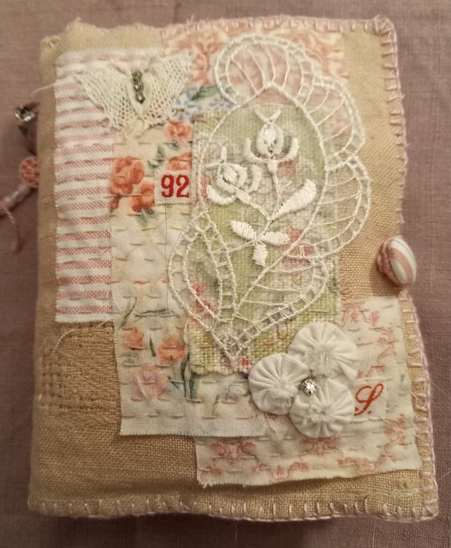 The pink linen needlecase with a little lace butterfly 