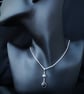 Silver pendant with hematite and onyx - Image 1
