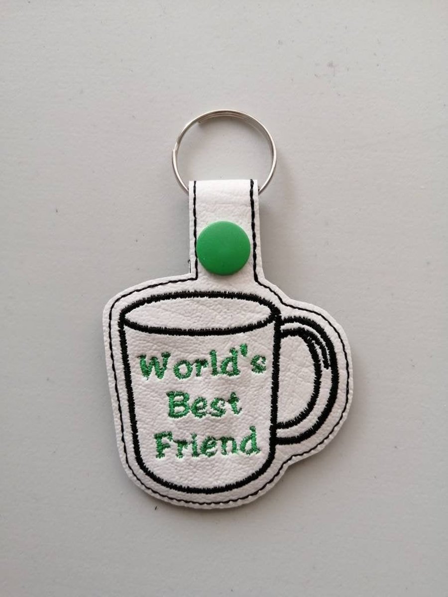 798. World's best friend mug keyring.