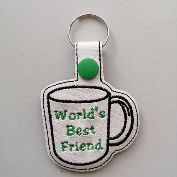 798. World's best friend mug keyring.