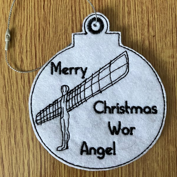 1305. Merry Christmas Wor Angel Christmas tree hanging decoration.