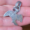 Raw silver Cormorant pendant