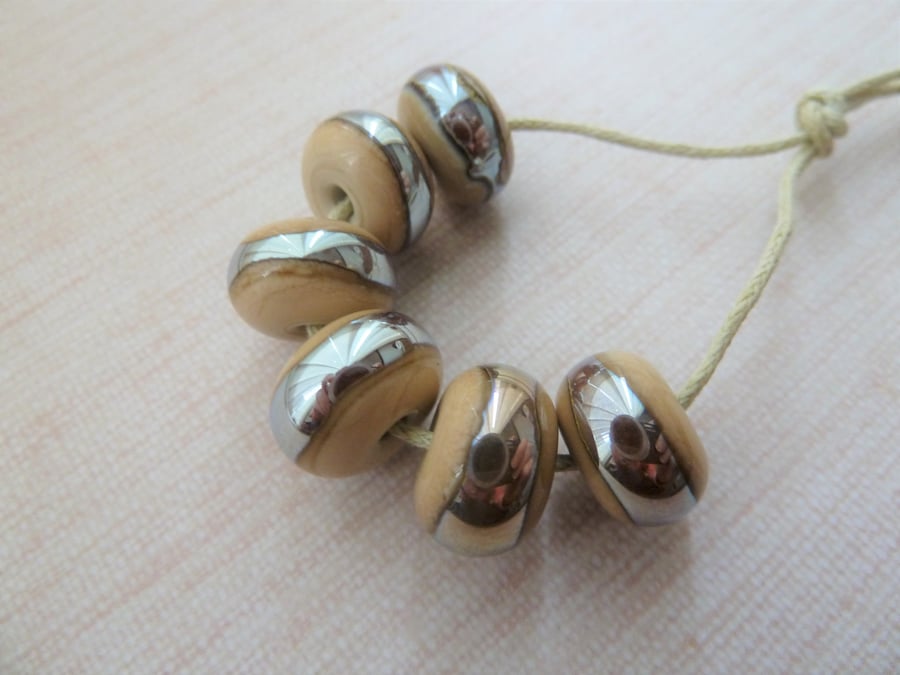 ivory and silver wrapped glass lampwork beads