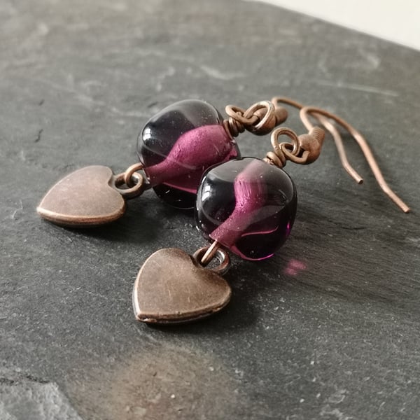 Plum purple lampwork glass nugget bead and copper heart charm earrings 