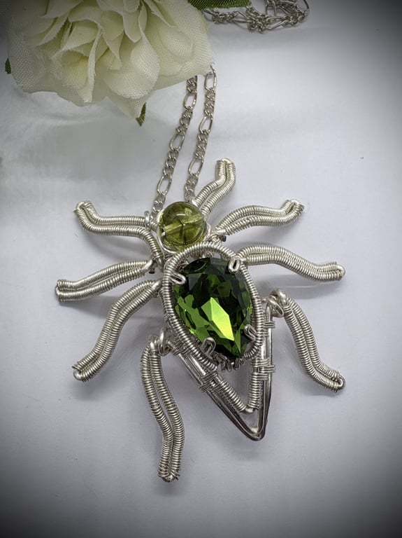 Silver wire wrapped Spider with Peridot and crystal details